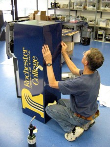 Applying the back panel.
