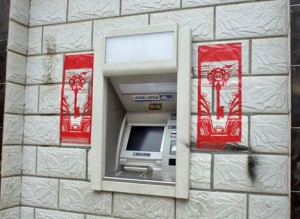 A duilian-equipped ATM in Lhasa, Tibet.