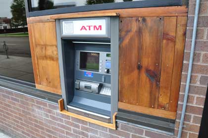A close-up of Sally's new ATM. The owner built the wooden enclosure; ATM Network installed the machine.